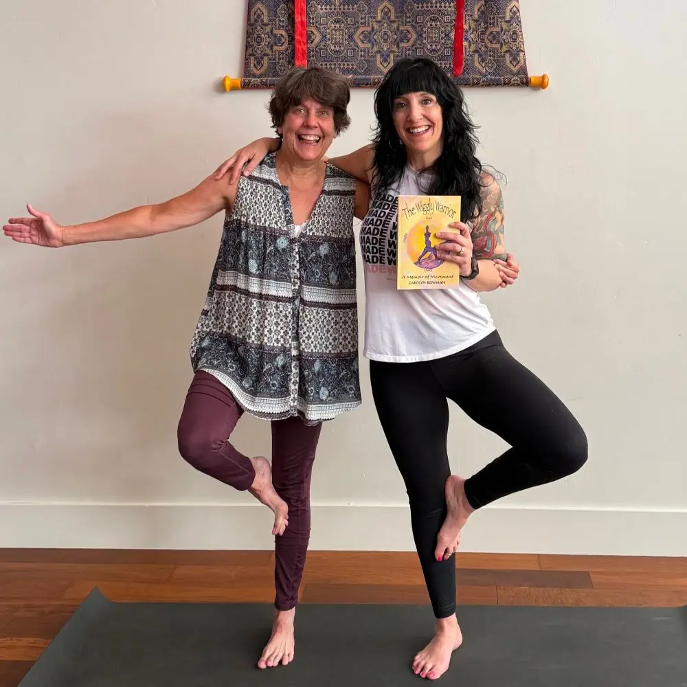 Carolyn Bowman and Noell Clark in tree pose.