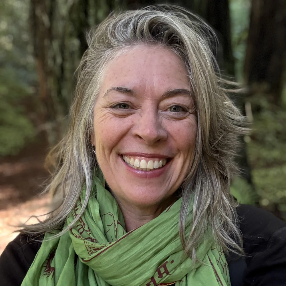 Picture of Jen Labreche smiling out in nature
