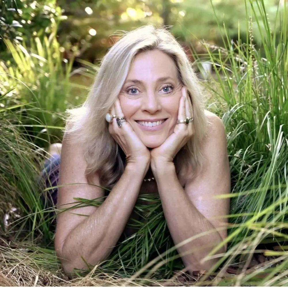Jennifer Prugh smiling in a garden