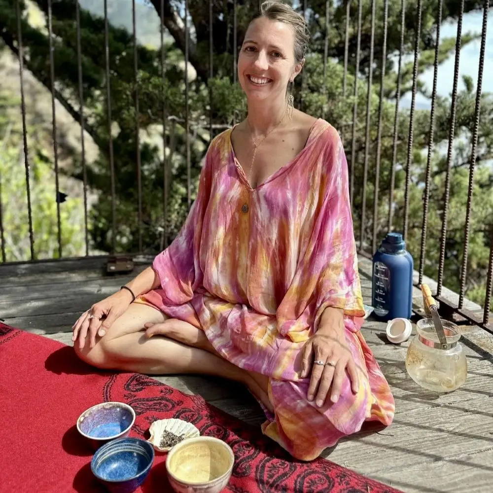 Katie Davidson seated outdoors