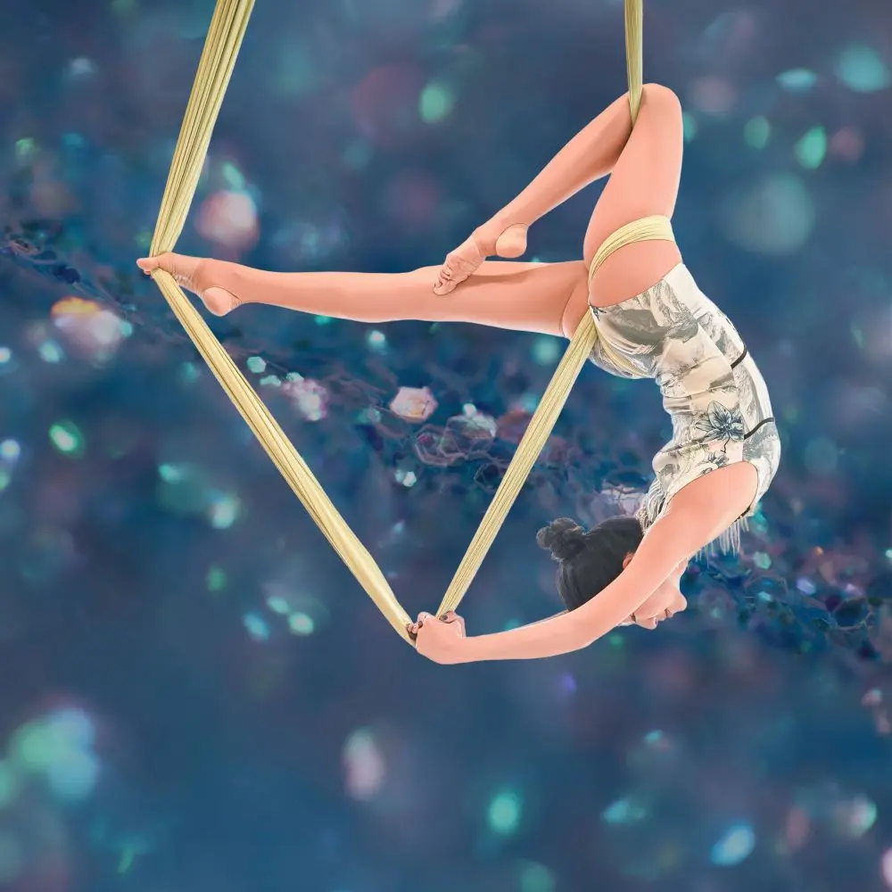 Yue Shen in an inversion using a silk aerial hammock