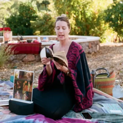 Katie Davidson reading out loud from a book