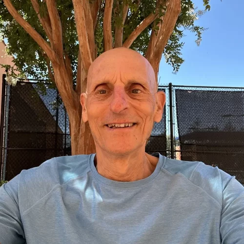 Mark Goldman smiling outdoors