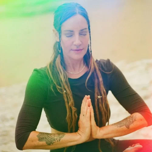 Naomi sitting in prayer