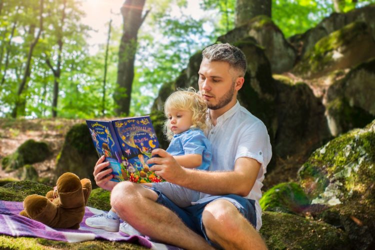 Canva - Photo Of Man And Child Reading Book During Daytime (1)