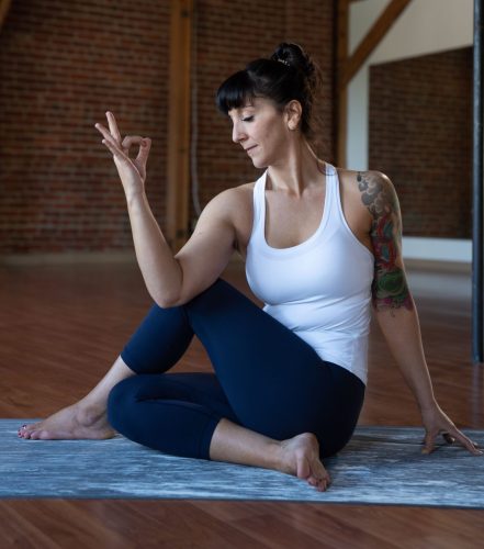 One Leg Revolving Seated Yoga Pose - Forte Yoga
