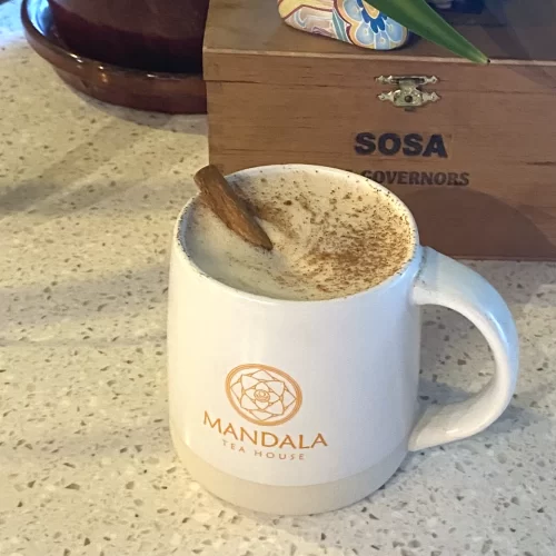 pumpkin spice latte in a white mandala tea house mug