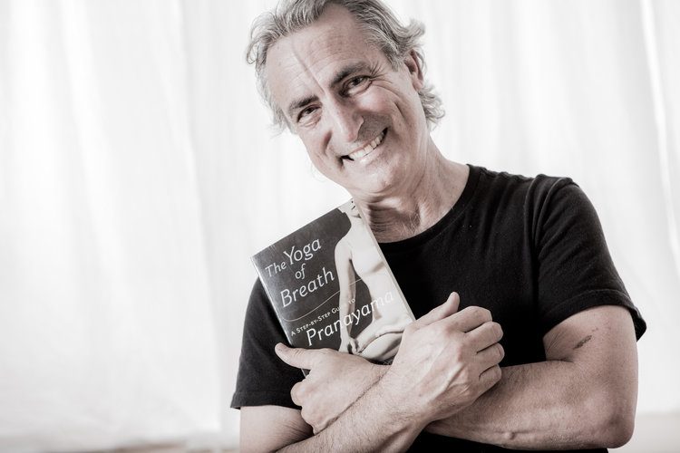 richard rosen holding his book