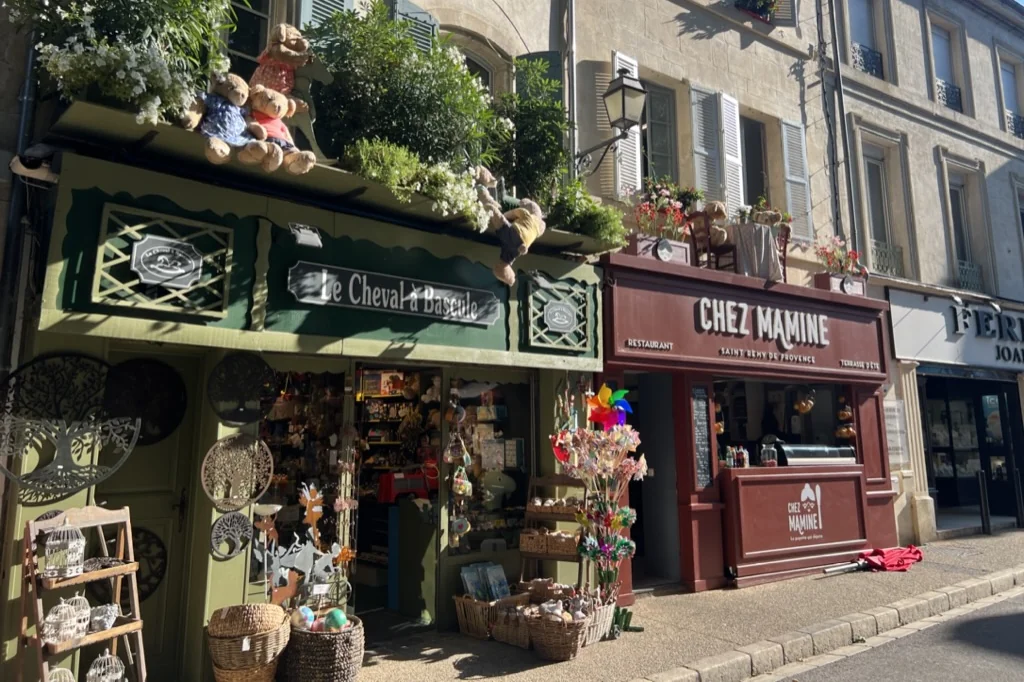 storefronts along a road in france