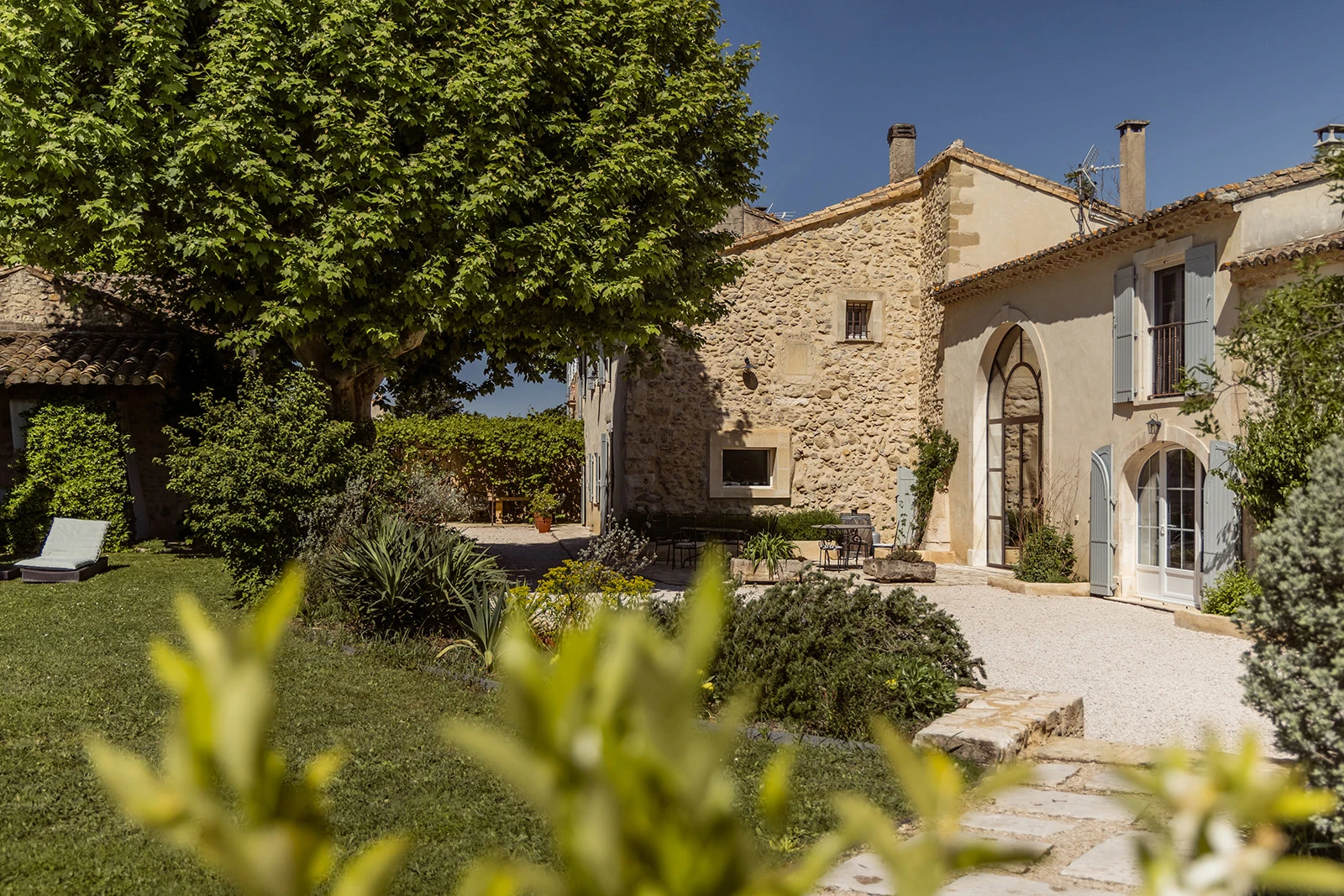 quaint house in france, with an adjacent garden