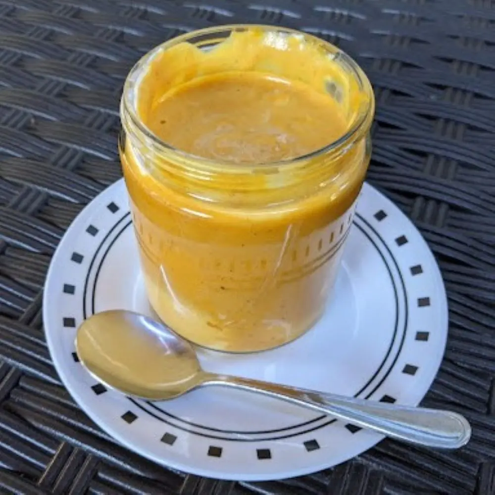 Golden Milk sweet potato puree in a small glass jar 
